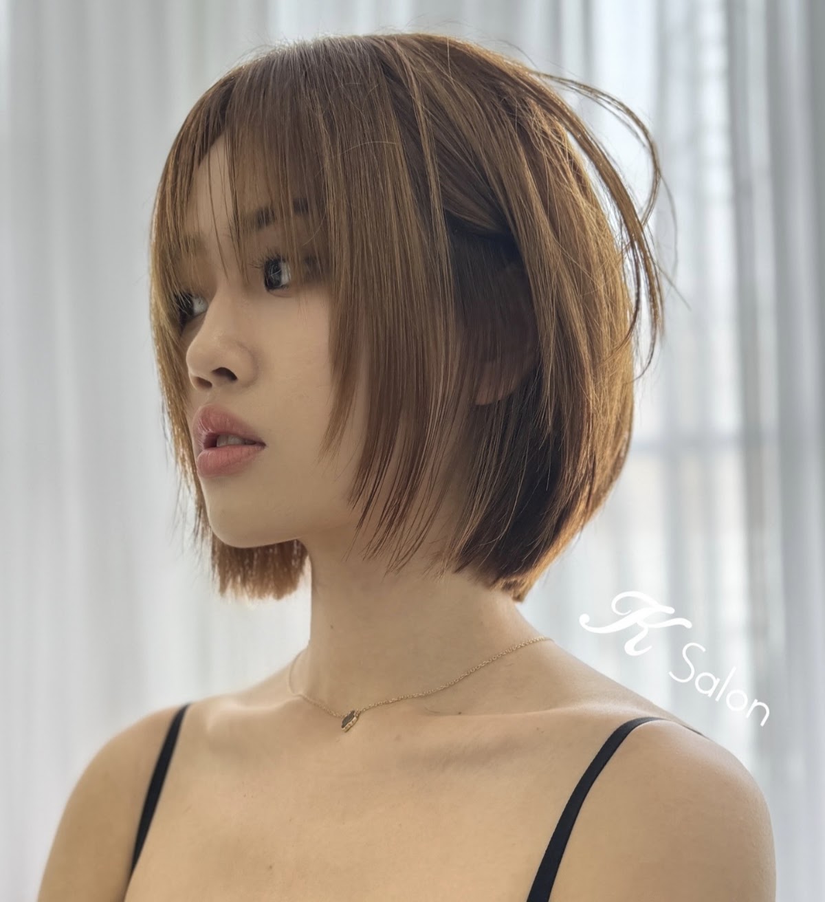 Blunt bob with wispy bangs